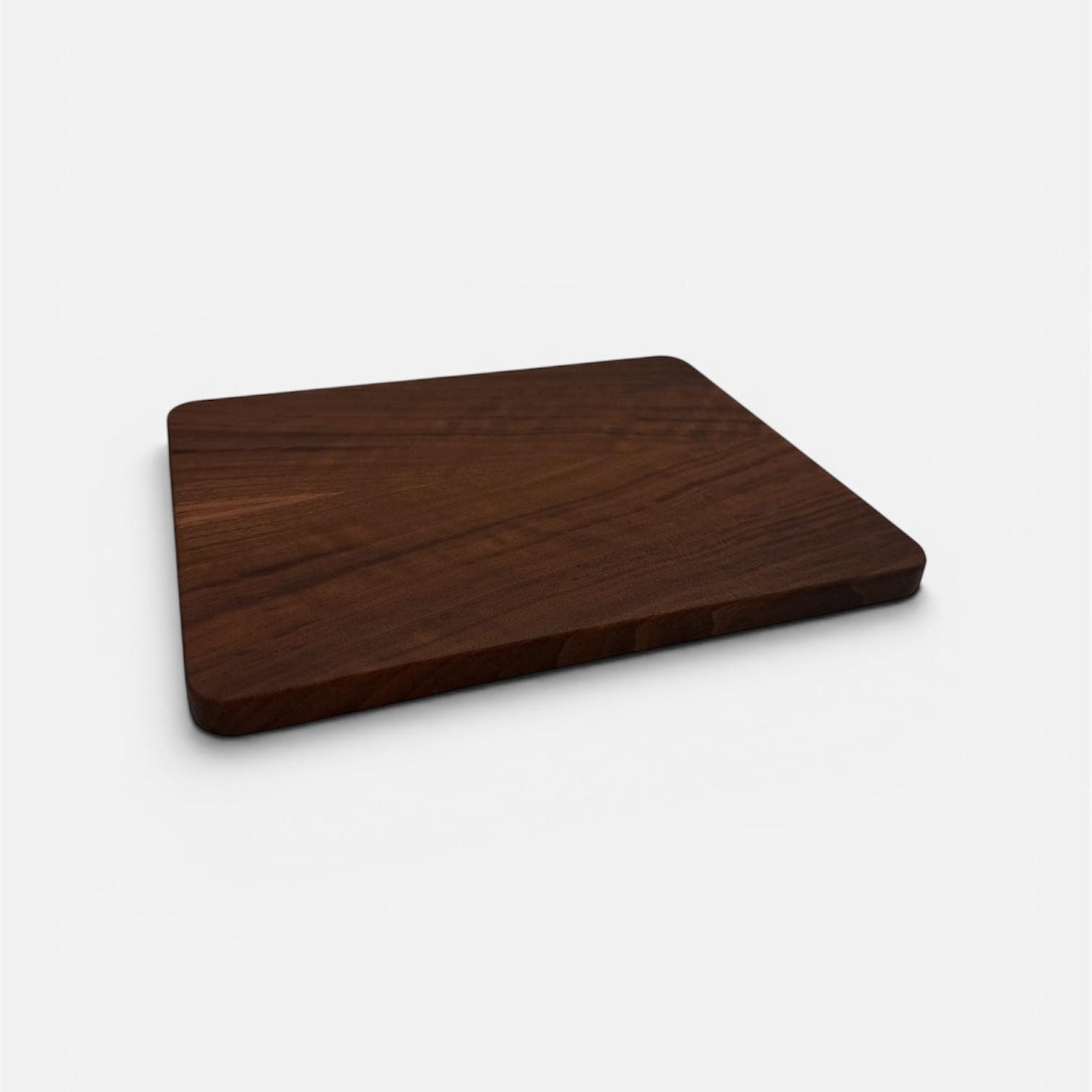 Wooden cutting board on a white background