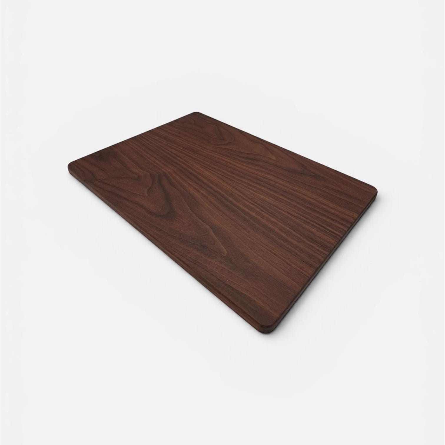 Wooden cutting board on a white background