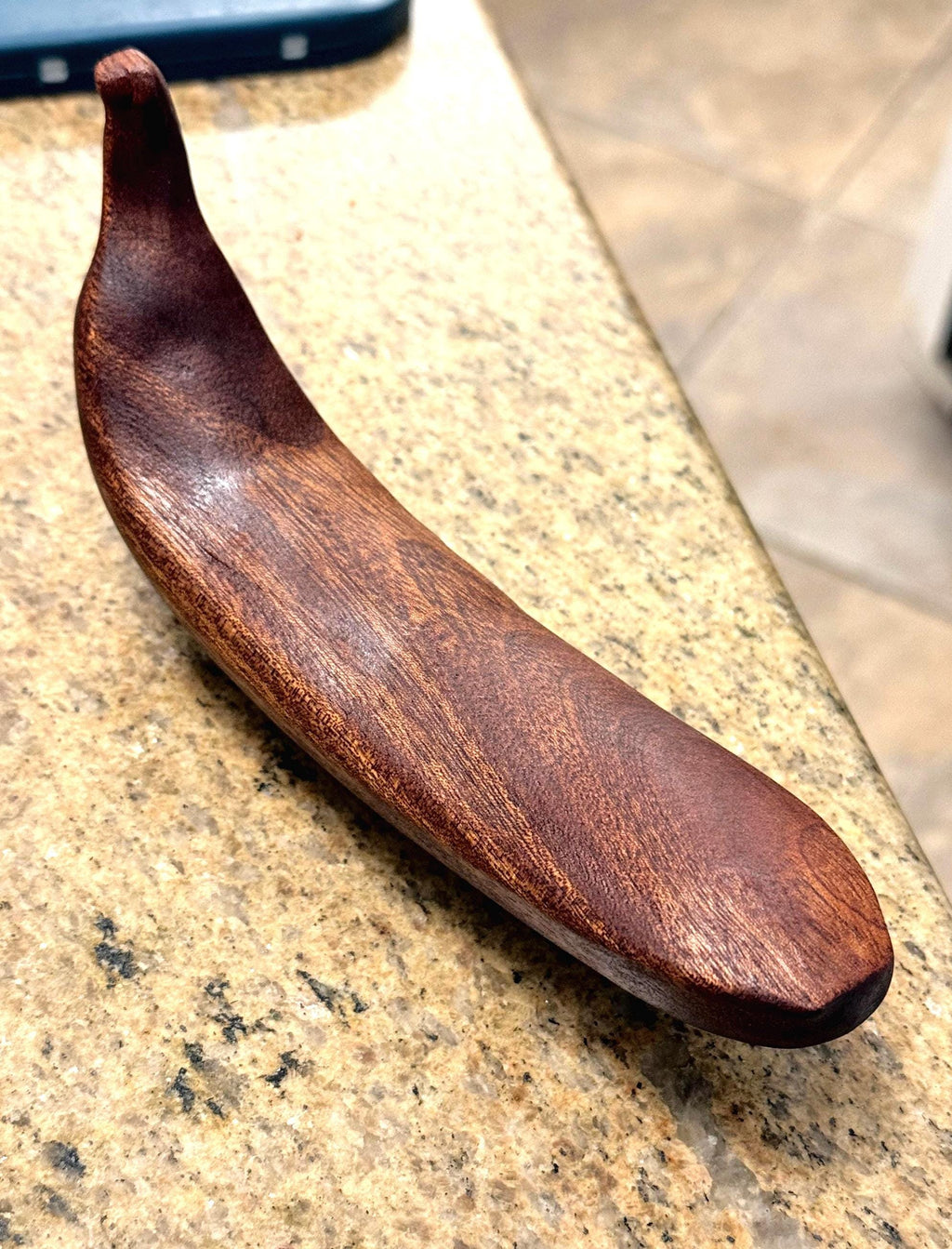 Wooden Banana on a countertop