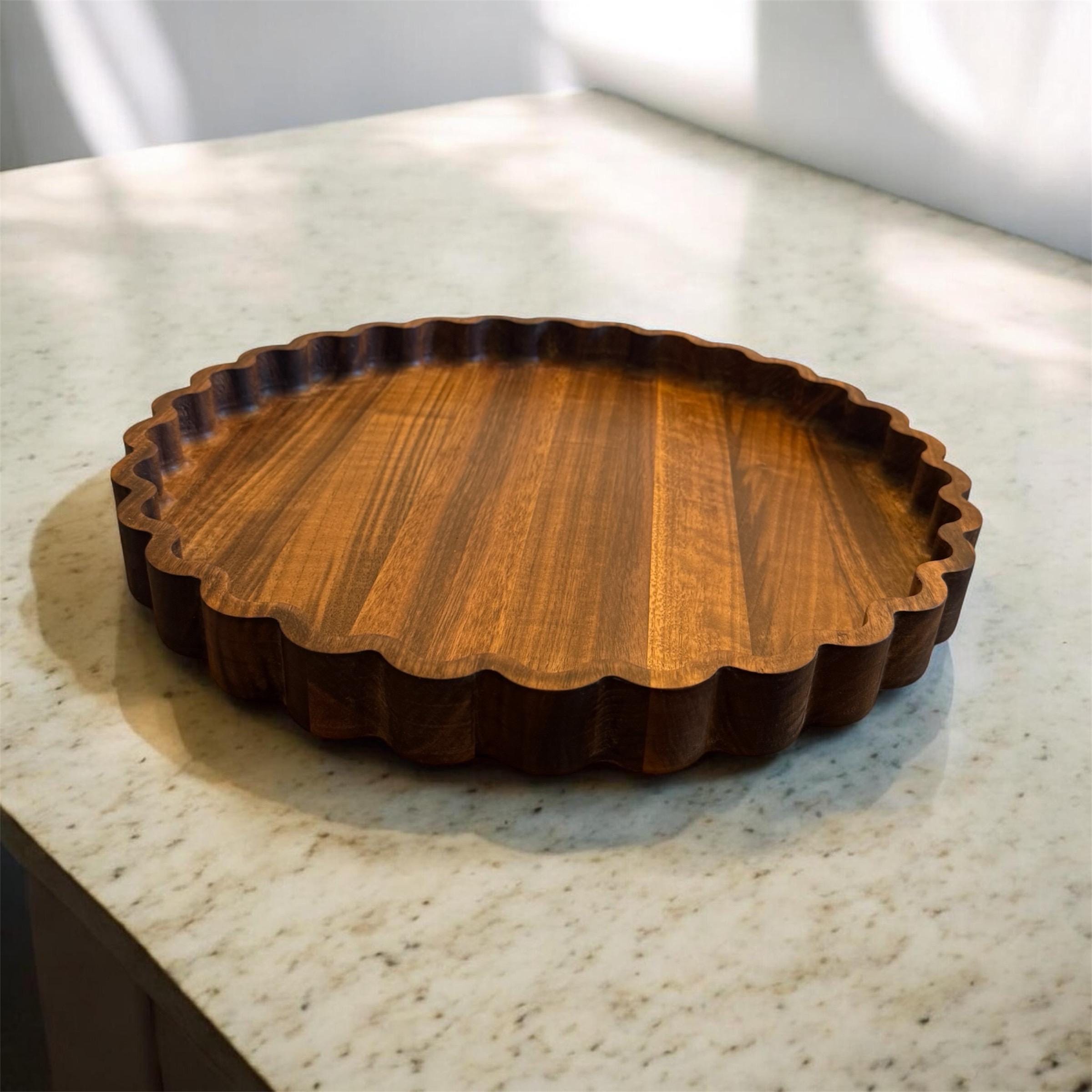 Wooden serving tray on a marble countertop