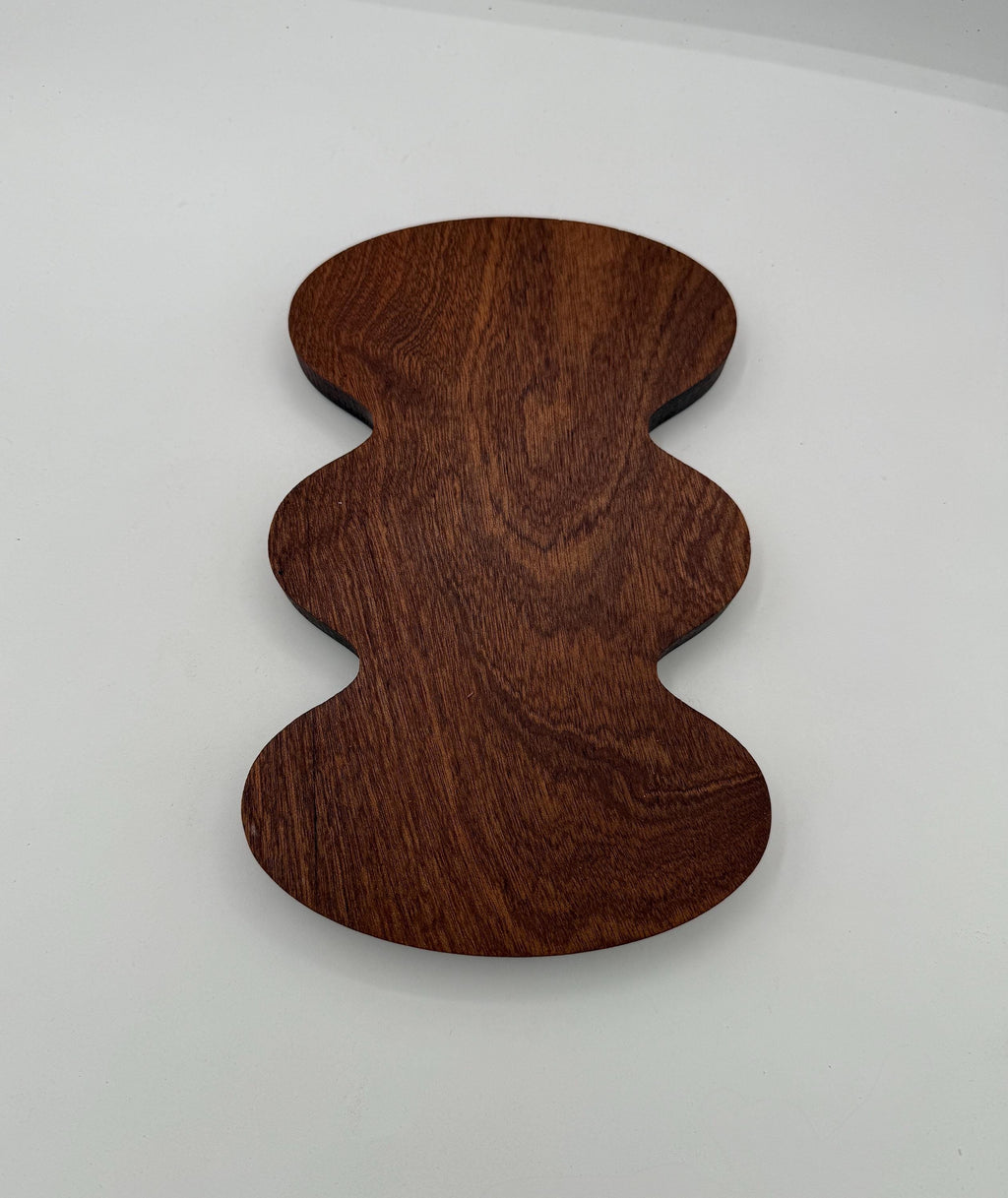 Bottom of a wooden wavy tray